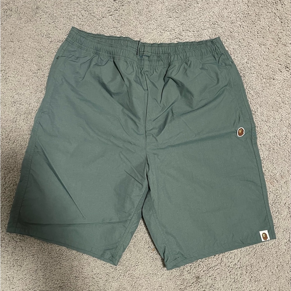 Bathing Ape shorts in green size XL